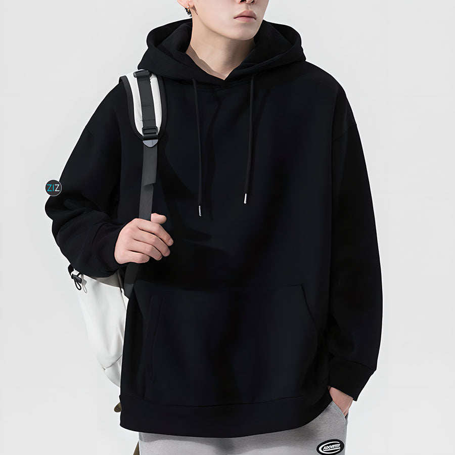 Áo khoác Hoodie Nam Nữ form rộng đen oversize, vải nỉ da cá mềm mại, túi trước tiện dụng và mũ trùm phong cách, dễ phối đồ