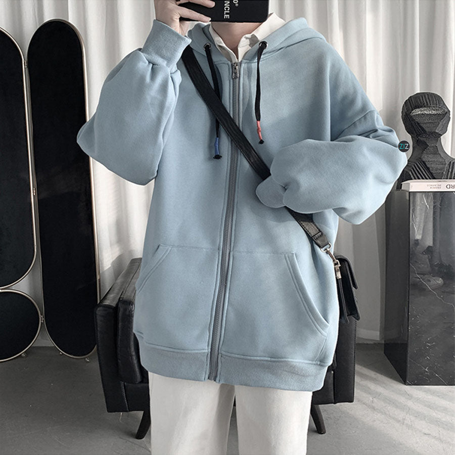 Hoodie xanh thiết kế unisex dáng rộng, mũ trùm đầu, dễ phối đồ, mang lại phong cách streetwear thoải mái cho cả nam và nữ