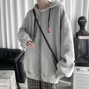 Hoodie oversized có mũ, chất nỉ chân cua mềm mịn, tay áo rộng, thiết kế unisex trẻ trung với dây kéo và túi trước tiện lợi