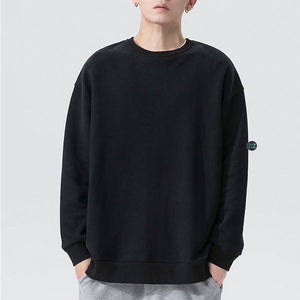 Sweater unisex màu đen trơn nhẹ nhàng, thiết kế form rộng oversize, lý tưởng cho nam nữ mặc đi học, đi làm, du lịch, dạo phố