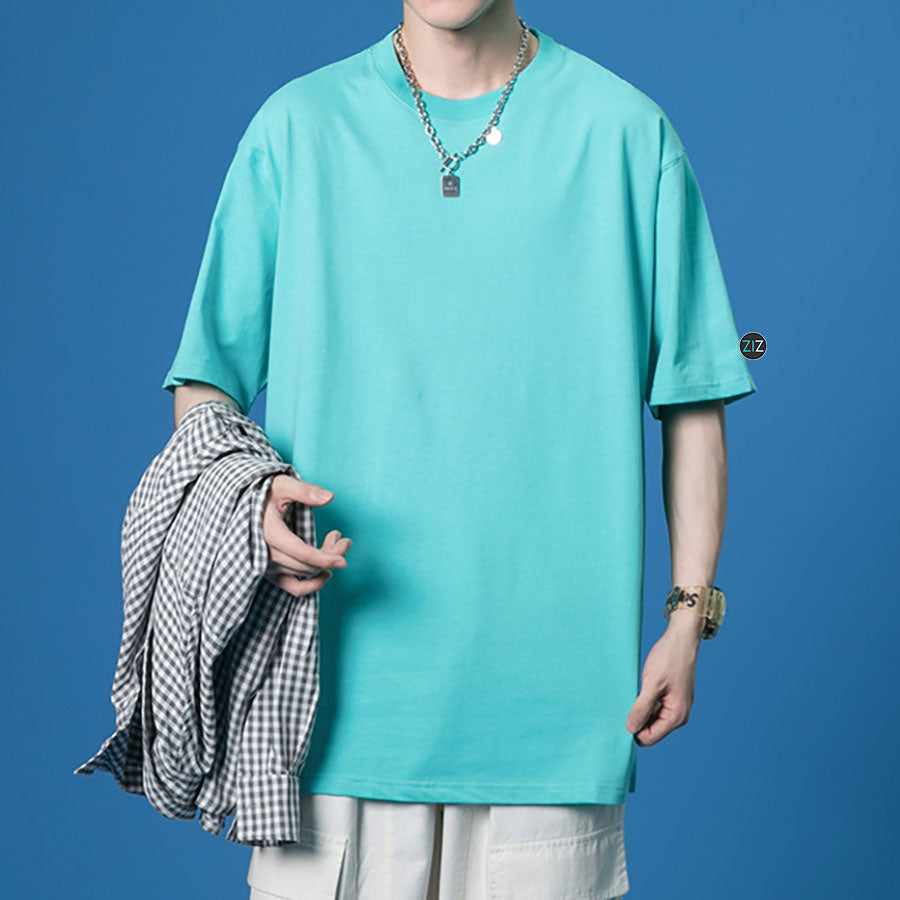 Áo thun oversized màu turquoise, chất liệu vải mềm mại, cổ tròn, tay ngắn, phù hợp nam nữ phong cách casual đến streetwear