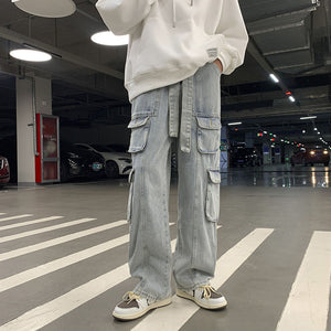 Quần Baggy Jean Nam Nữ form rộng, vải denim xanh, nhiều túi hộp tiện lợi, dễ phối đồ với áo thun và giày thể thao sneaker