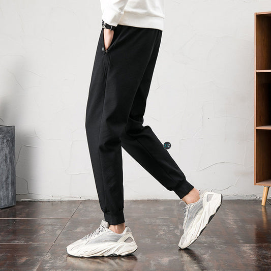 Quần Jogger Nam Nữ cao cấp đen form vừa, vải nỉ co giãn mềm mại, cổ chân bó gọn giúp thoải mái mặc đi học, chơi thể thao