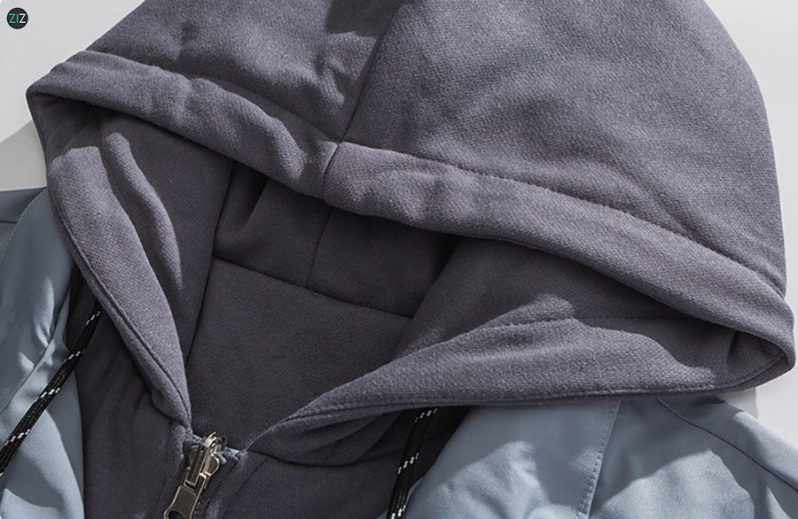 Áo khoác Nam Nữ có mũ trùm may liền với áo, thiết kế oversize rộng rãi, tay áo bo thun, chi tiết sọc trắng tạo điểm nhấn