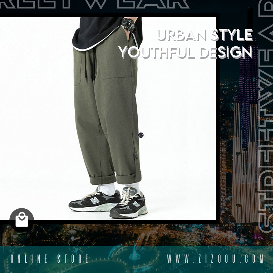 Quần streetwear màu xanh, dáng suông rộng, xắn gấu, vải kaki thoáng khí, dễ phối đồ, phù hợp phong cách casual đường phố