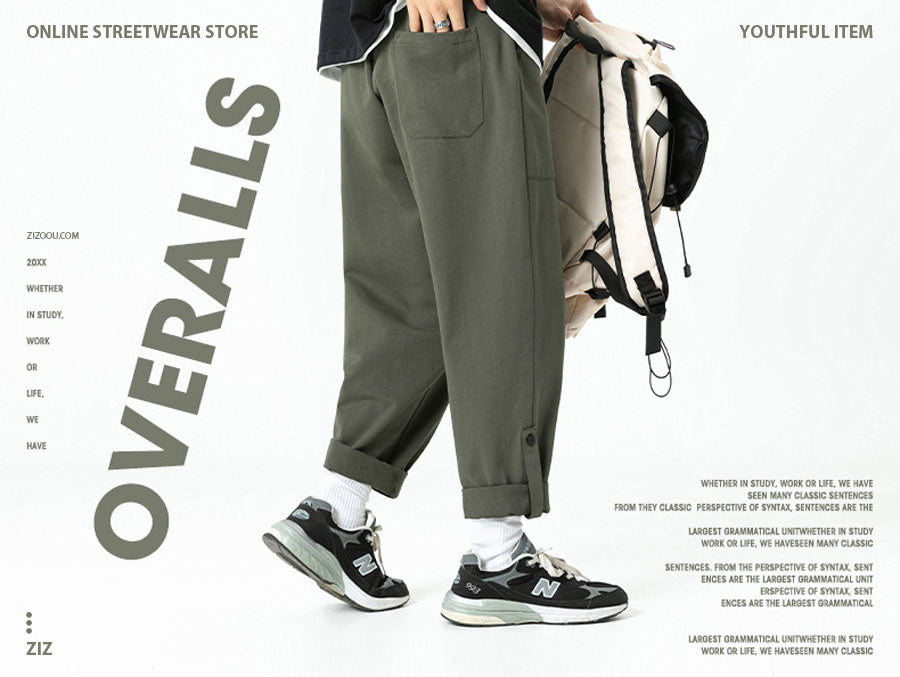 Quần Nam Nữ Baggy suông rộng màu xanh xanh oliu, thiết kế gập ống và dây rút, mặc với áo thun và giày sneaker chất cool ngầu