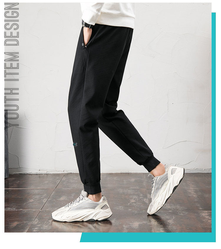 Quần Jogger thun nam nữ đen thời trang Hàn Quốc, dễ mặc với áo thun và giày thể thao khi đi học, chơi thể thao và dạo phố