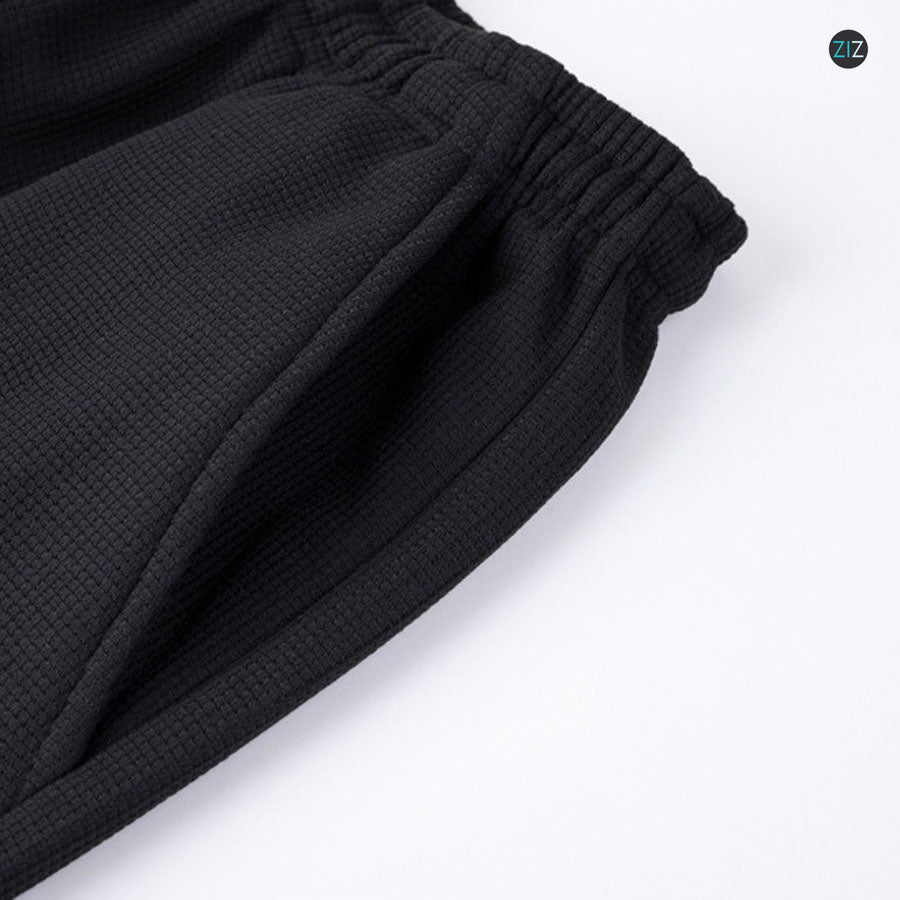 Quần jogger nam nữ kiểu dáng thể thao, có 2 túi bên hông tiện lợi