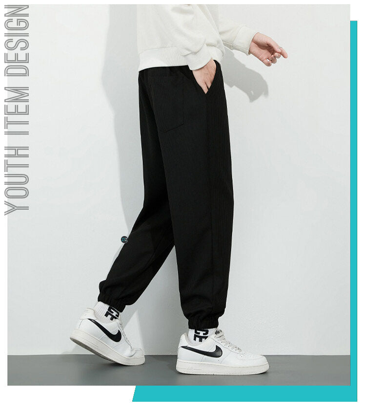 Quần Jogger ống rộng nỉ đen nam nữ, bo gấu và dây rút tiện lợi, giữ ấm tốt, lý tưởng cho mùa thu đông và thời trang dạo phố